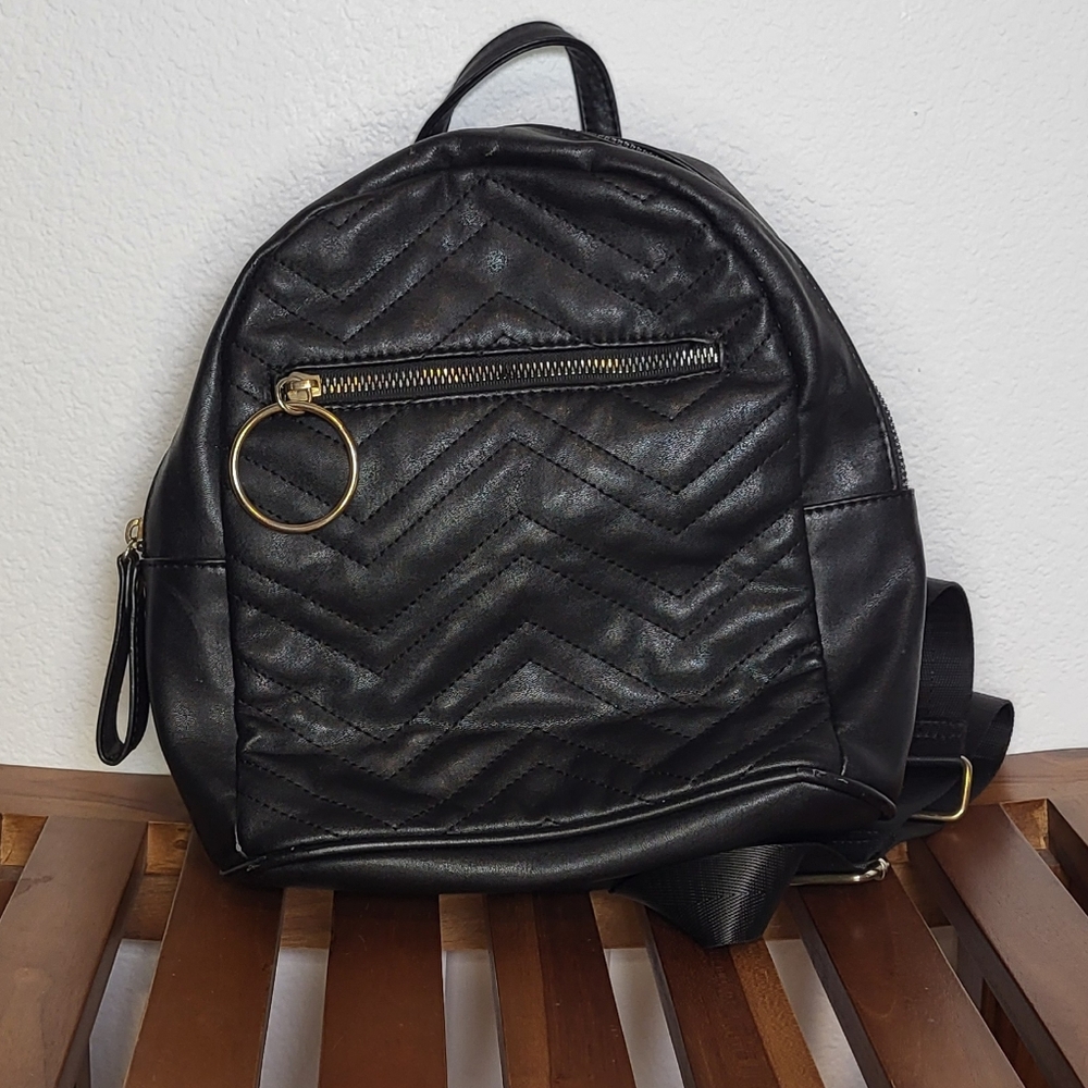 Elegant Black Faux Leather Backpack